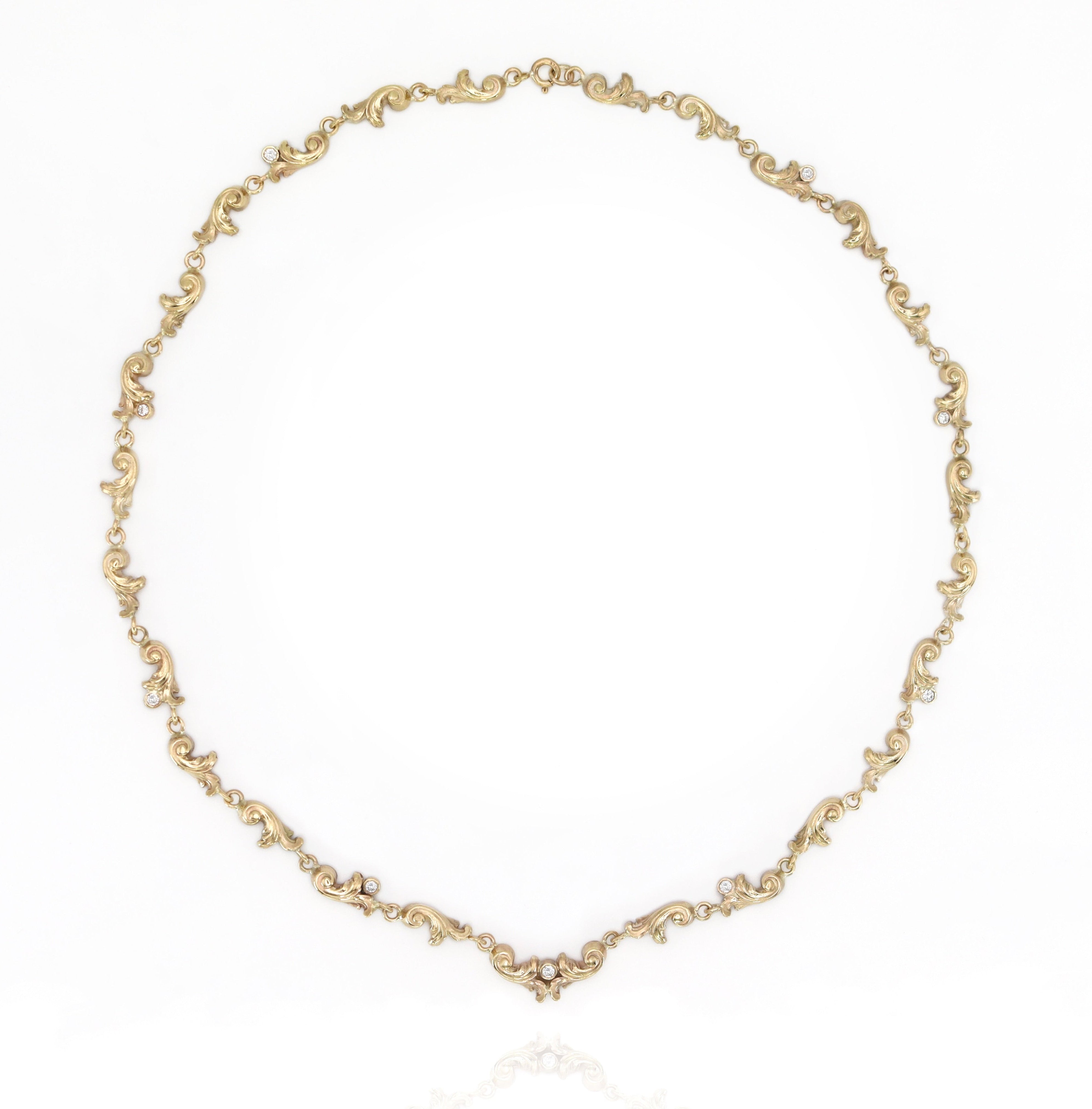 Gold necklace on a white background