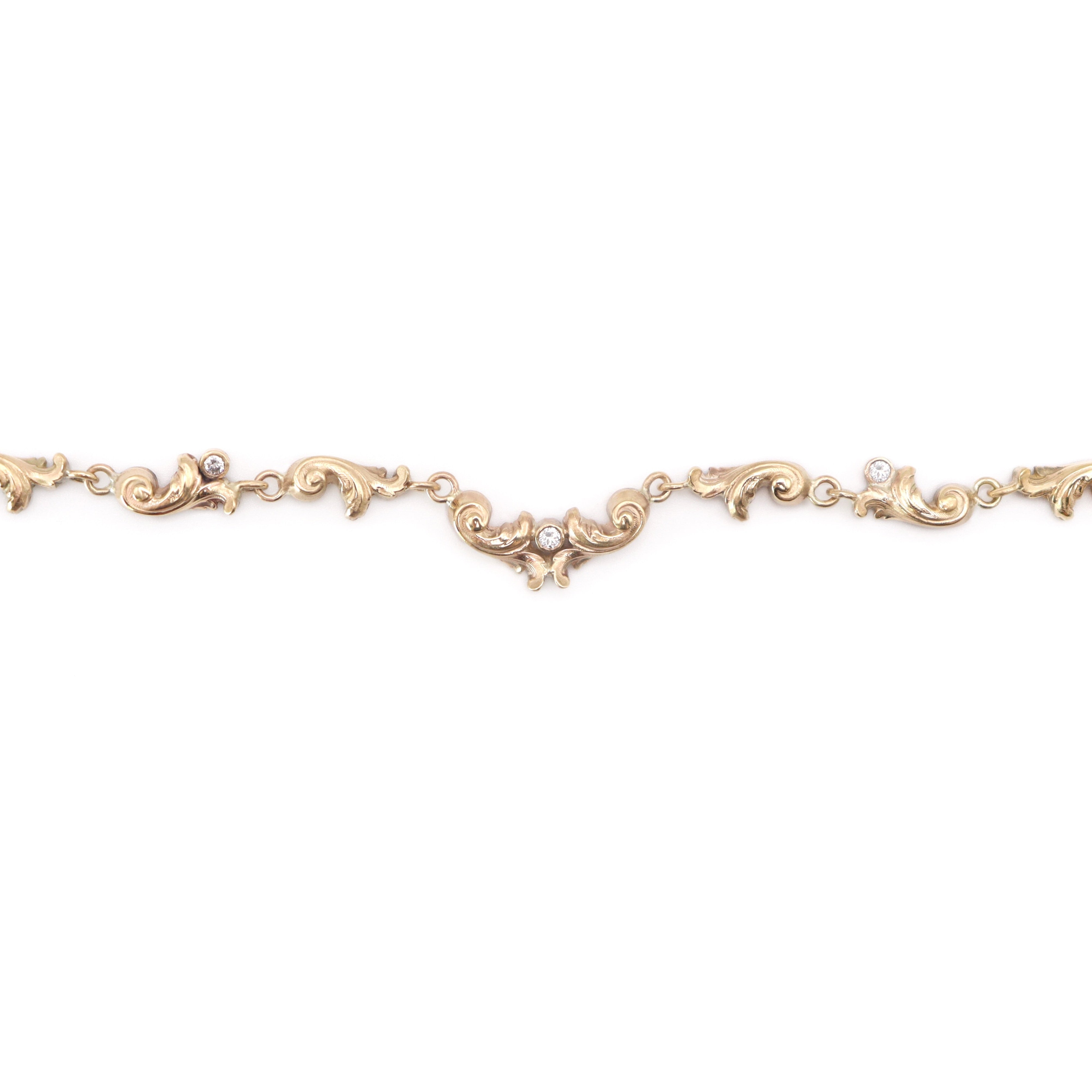Gold necklace on a white background